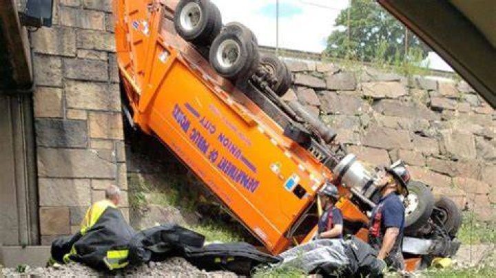 Garbage truck overturns near NYC Lincoln Tunnel, injuring at least 12