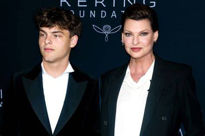 Linda Evangelista and son Augustin twin in matching suits at 2nd Annual