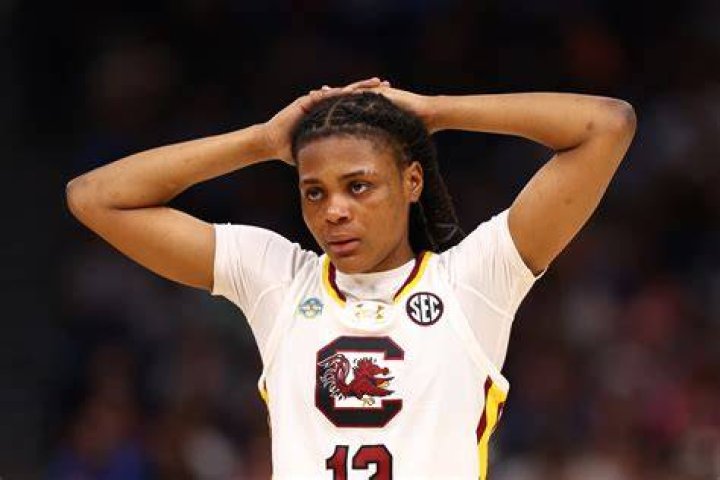 Milaysia Fulwiley dunk South Carolina's Dawn Staley reacts to signee