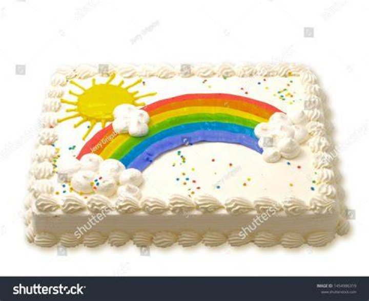 Rainbow and clouds cake Decorated Cake by Angel Cake CakesDecor